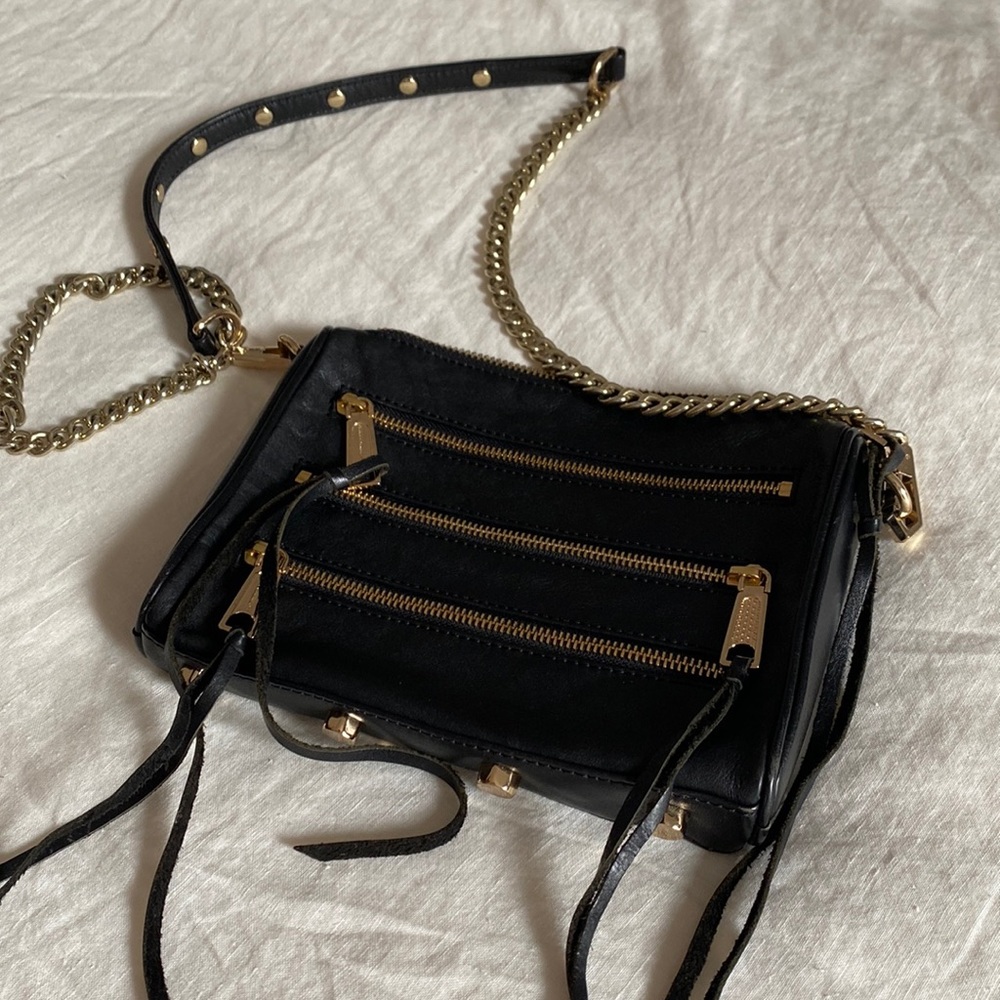 Rebecca Minkoff famous mini 5-Zip convertible cross-body handbag.
